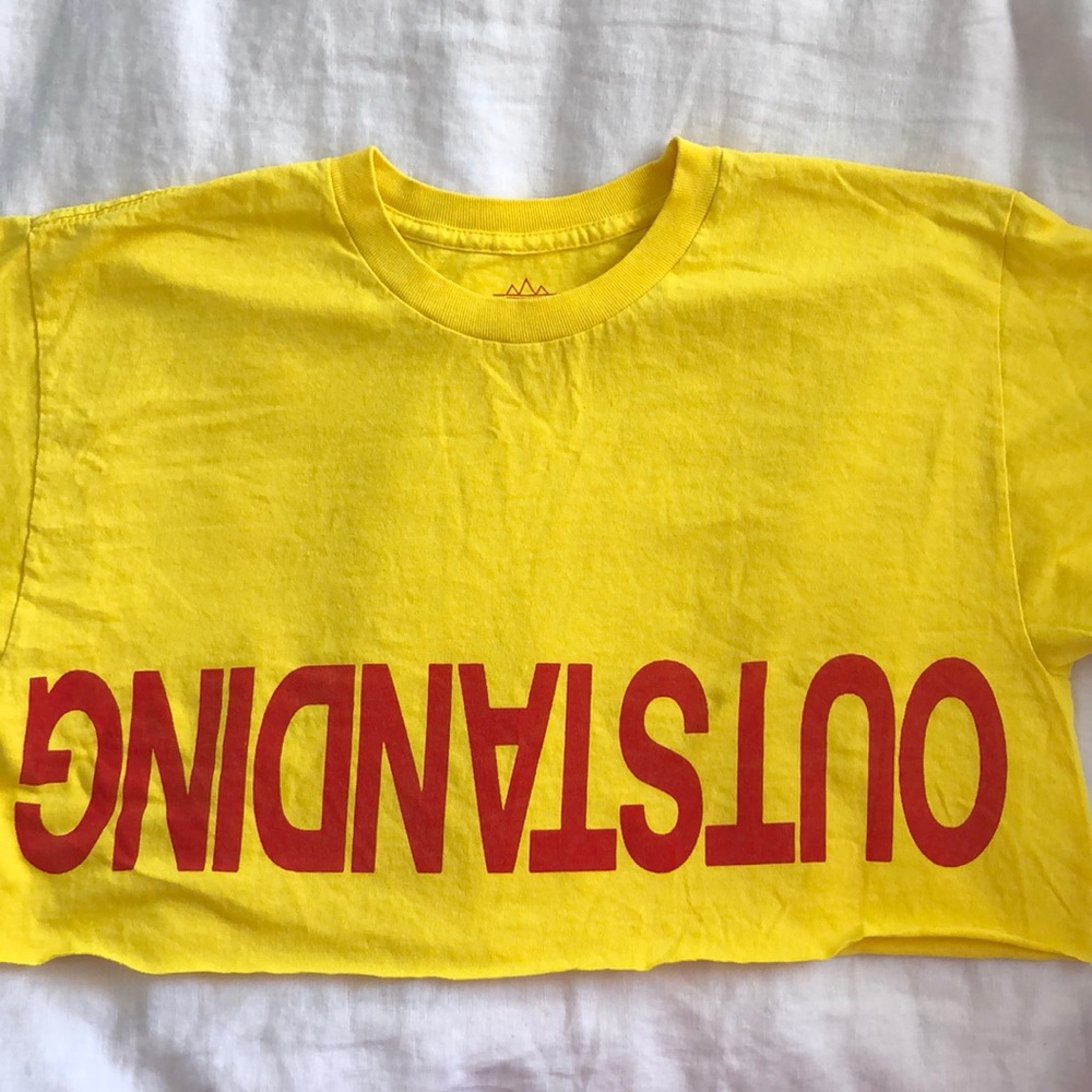 Short sleeve yellow cropped “Outstanding” tee